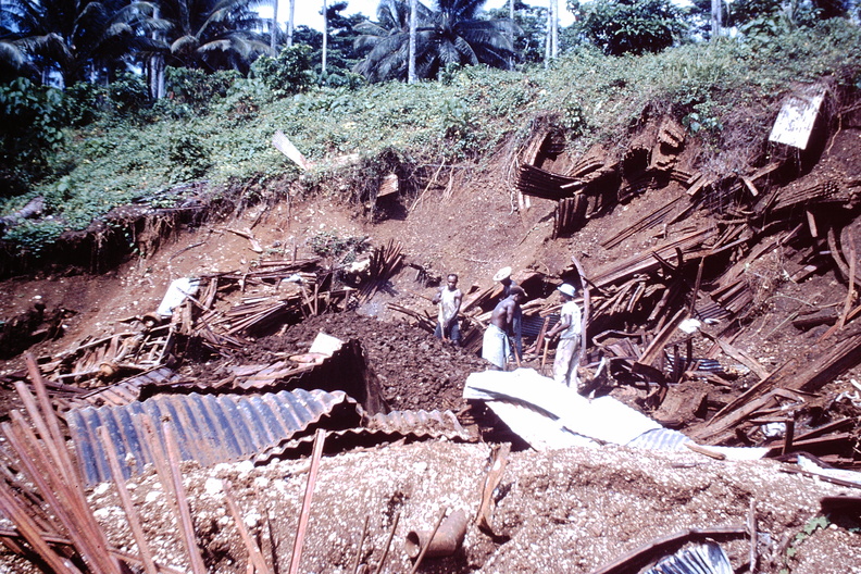 1960 Dec - Digging up building material from army dump Banika.JPG